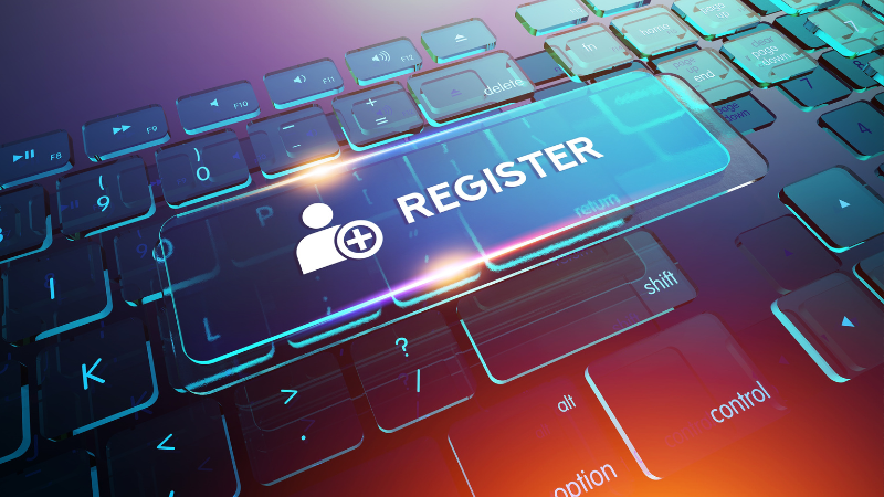 Graphic interpretation of computer keyboard with larger key floating above with register written on it