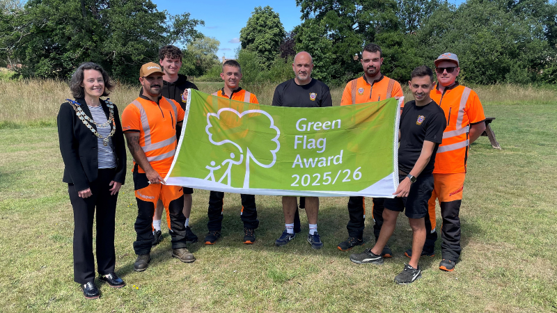 Gillingham mayor, Grounds Team and GANG volunteers with Green Flag Award banner